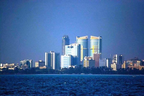Dar es Salaam skyline with office towers seen across the water.